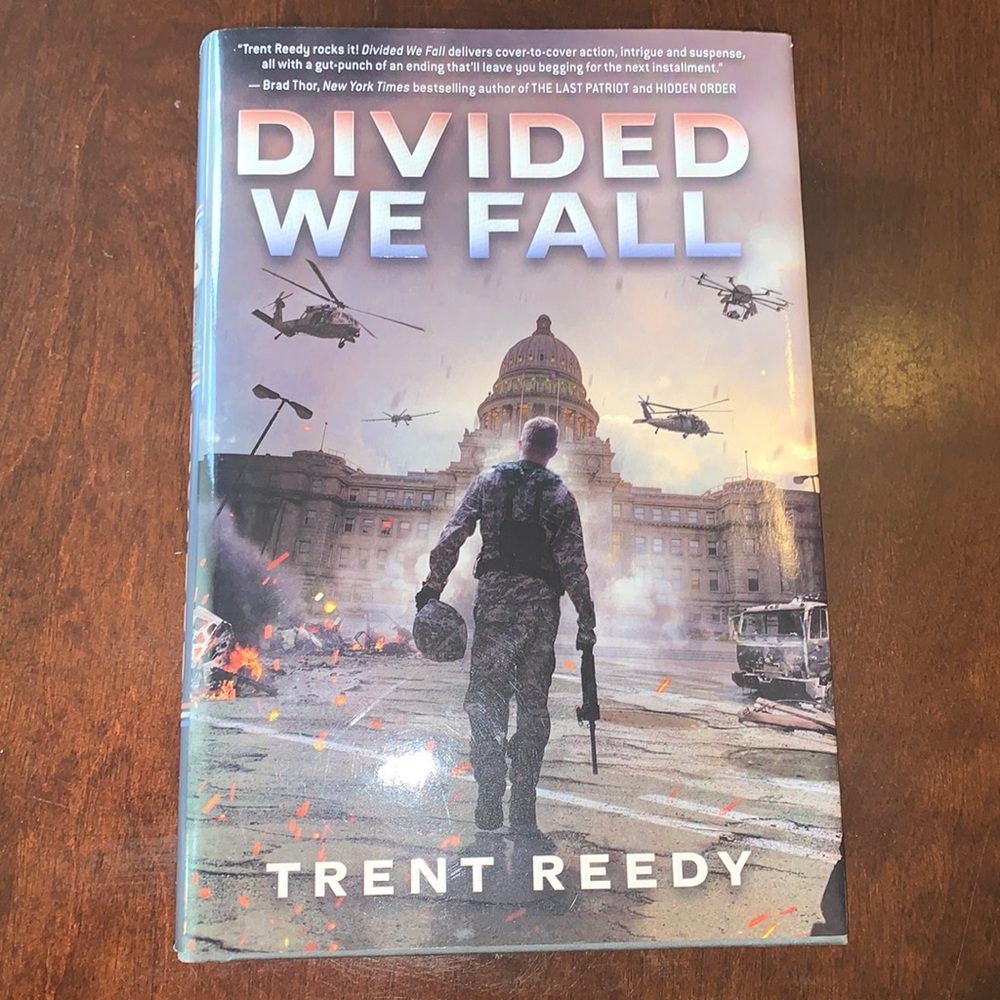 3/$20 Divided We Fall By Trent Reedy Hardcover Book